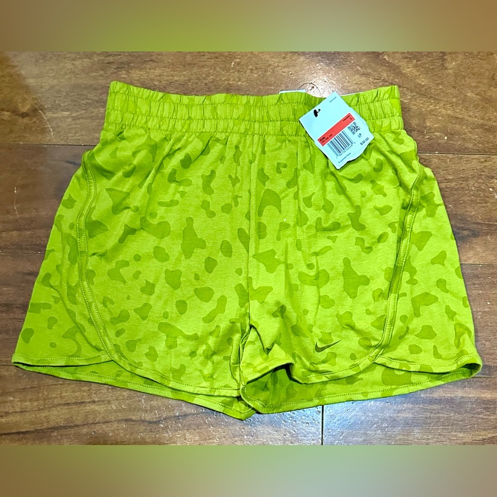 Girls Nike shorts, new with tags, has legging shorts under, size Large